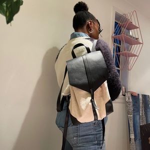 White and black back pack